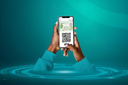 Nigerian using phone to link BVN to NIN online without visiting bank 2026