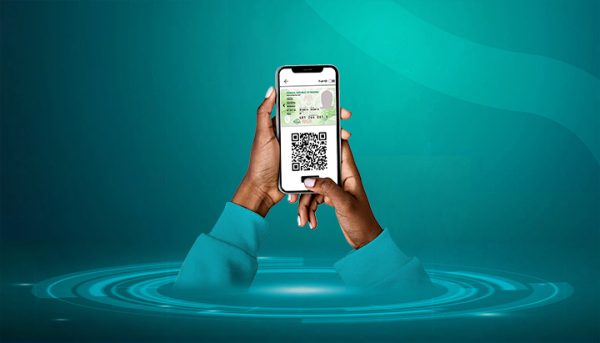 Nigerian using phone to link BVN to NIN online without visiting bank 2026