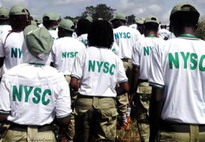 Frustrated graduate in Osun checking NYSC in 2026 mobilization status on phone